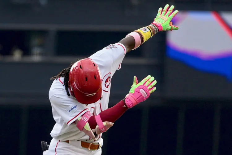 Reds rally to beat Athletics for 4th straight win